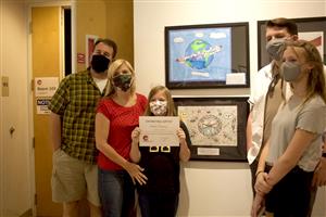 Proud family at the Word & Image exhibit 